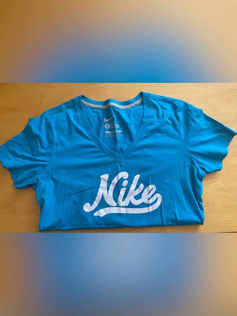Nike Blue V-Neck Tee with White Script Logo. Large. New without tags